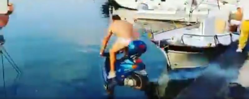 (Video) Former Liverpool forward pays man €2k to drive bike into the sea