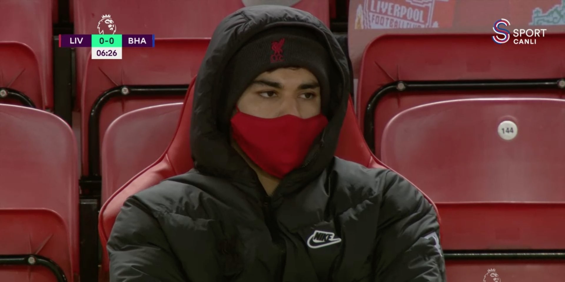 Ozan Kabak and Naby Keita watch on as Liverpool host Brighton at Anfield