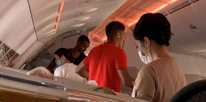 (Image) Joel Matip and Raphael Varane pictured on a trip to Dubai as the two centre-backs share a plane journey together
