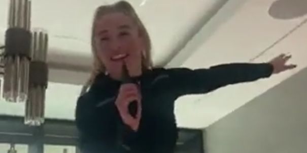(Video) Watch Liverpool star Missy Bo Kearns belting out Divock Origi ‘Saturday Night’ song on top of a table after Wolves win