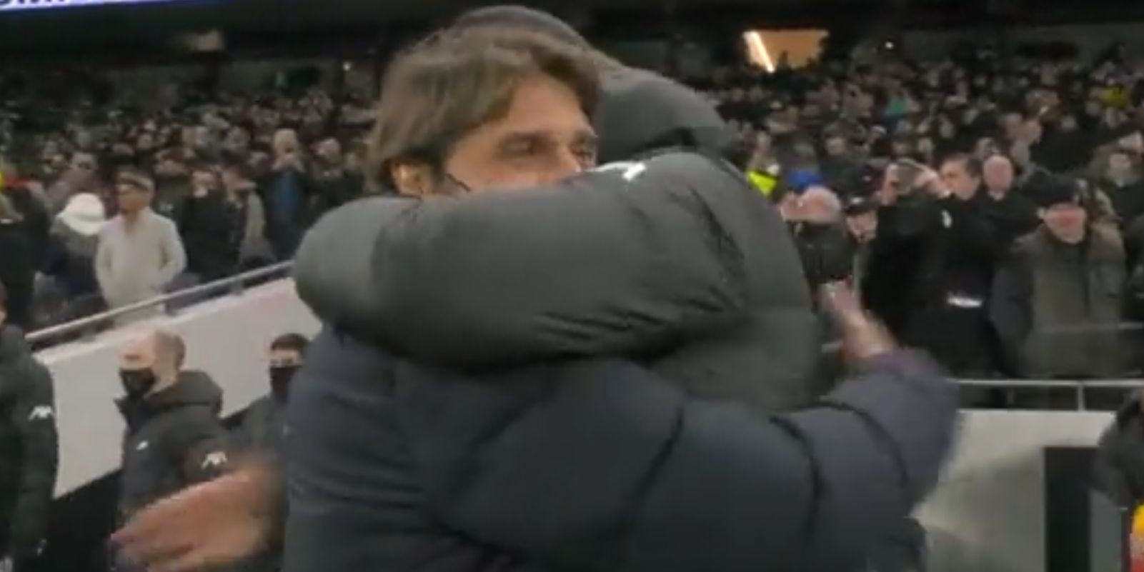 (Video) Awkward handshake/fist-bump between Klopp and Conte leads to impromptu hug between masked managers