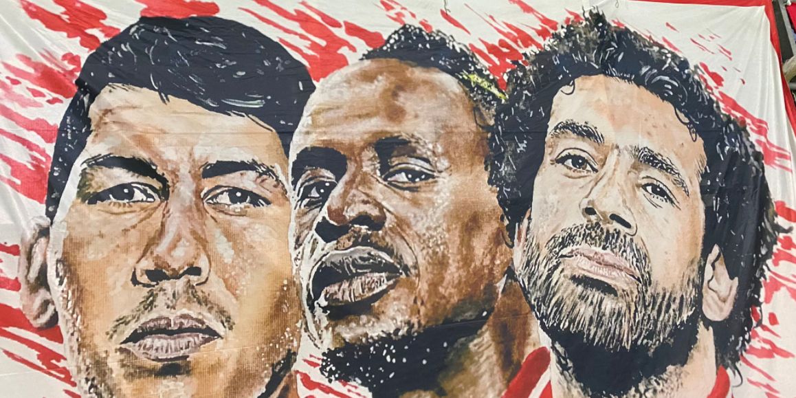 (Image) New banner spotted in the San Siro that features Bobby Firmino, Sadio Mane and Mo Salah