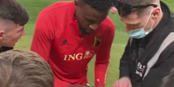 (Video) Divock Origi takes time to sign Liverpool shirts whilst on international duty with Belgium