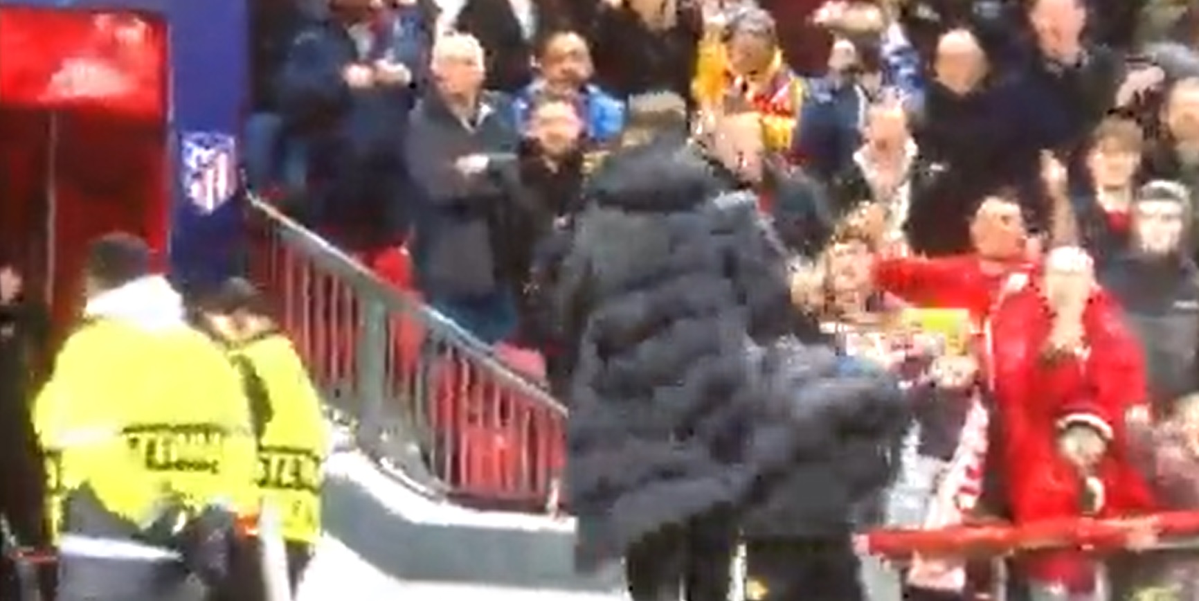 (Video) Watch Man Utd fans pelt Simeone with projectiles after Champions League exit