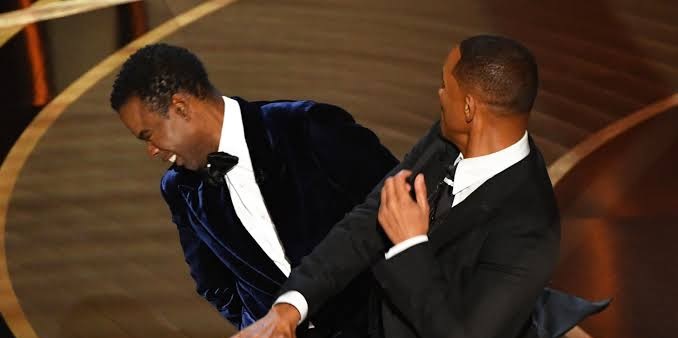 (Photo) Carragher’s cheeky nod to Will Smith & Chris Rock’s Oscars punch-up in hilarious post