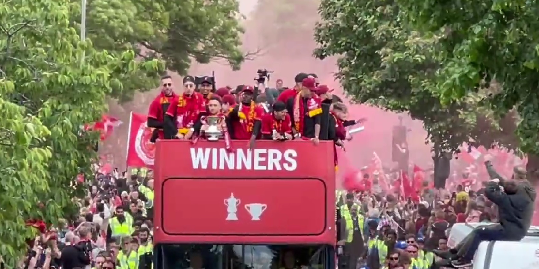 (Video) Liverpool fans give cup double-winning Reds a heroes welcome in trophy parade