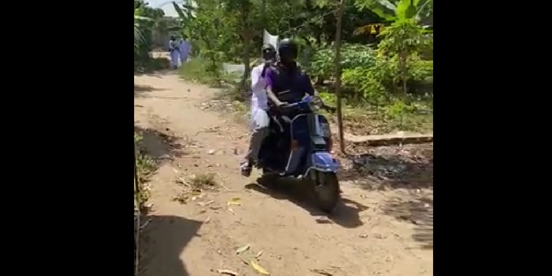 (Video) Delighted Ibrahima Konate spotted riding on back of a bike in Tanzania