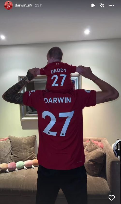 Darwin Nunez poses with his son in Liverpool shirts