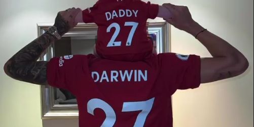 Darwin Nunez poses with his son as the pair wear Liverpool shirts adorned with No.27