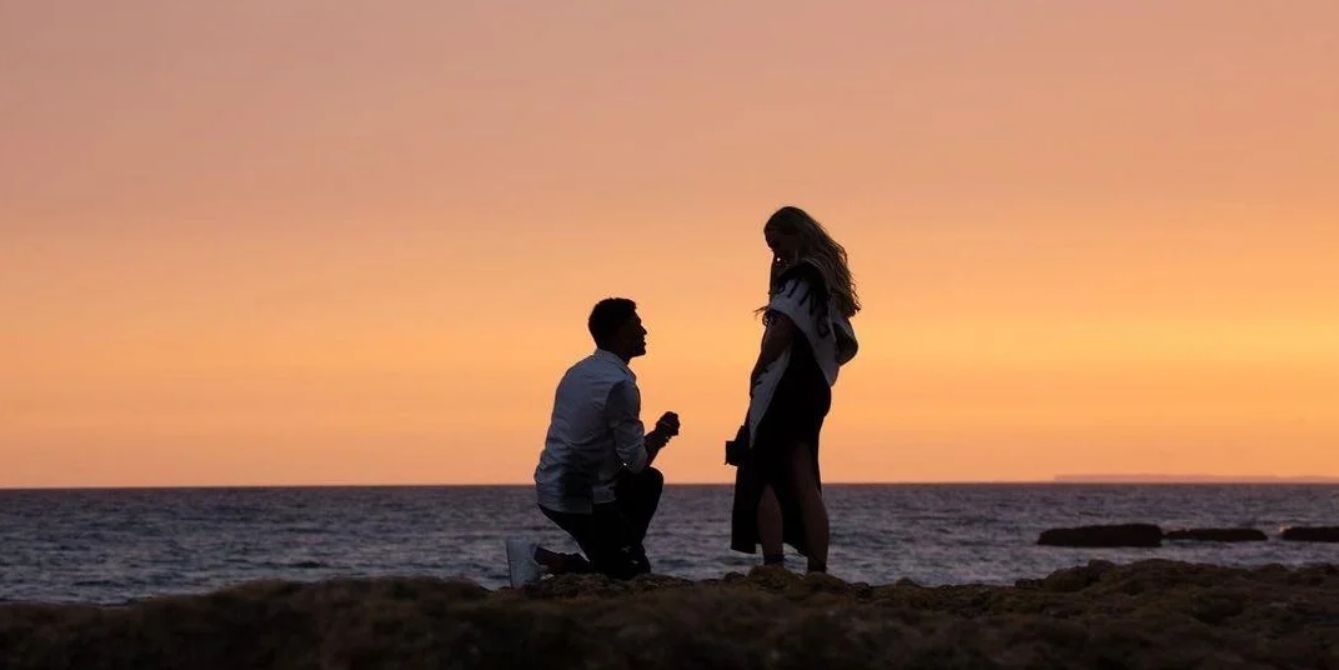 (Image) Alex Oxlade-Chamberlain proposes to Perrie Edwards as couple enjoy post-season holiday