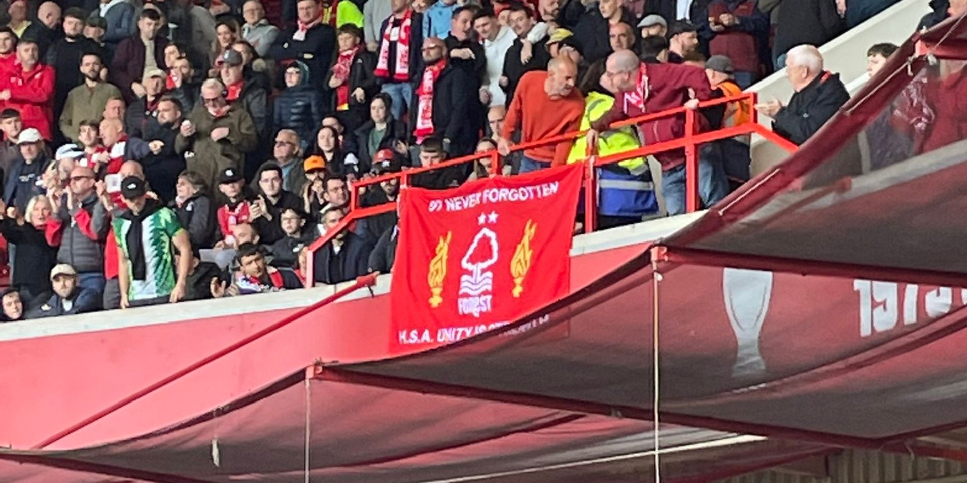 (Image) Forest fans unveil Hillsborough banner amidst abhorrent chants inside the City Ground