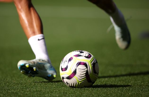 A Liverpool player strikes the ball during a pre-match warm-up