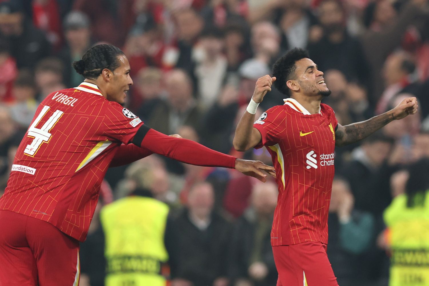 Virgil van Dijk and Luis Diaz celebrate victory over Leverkusen