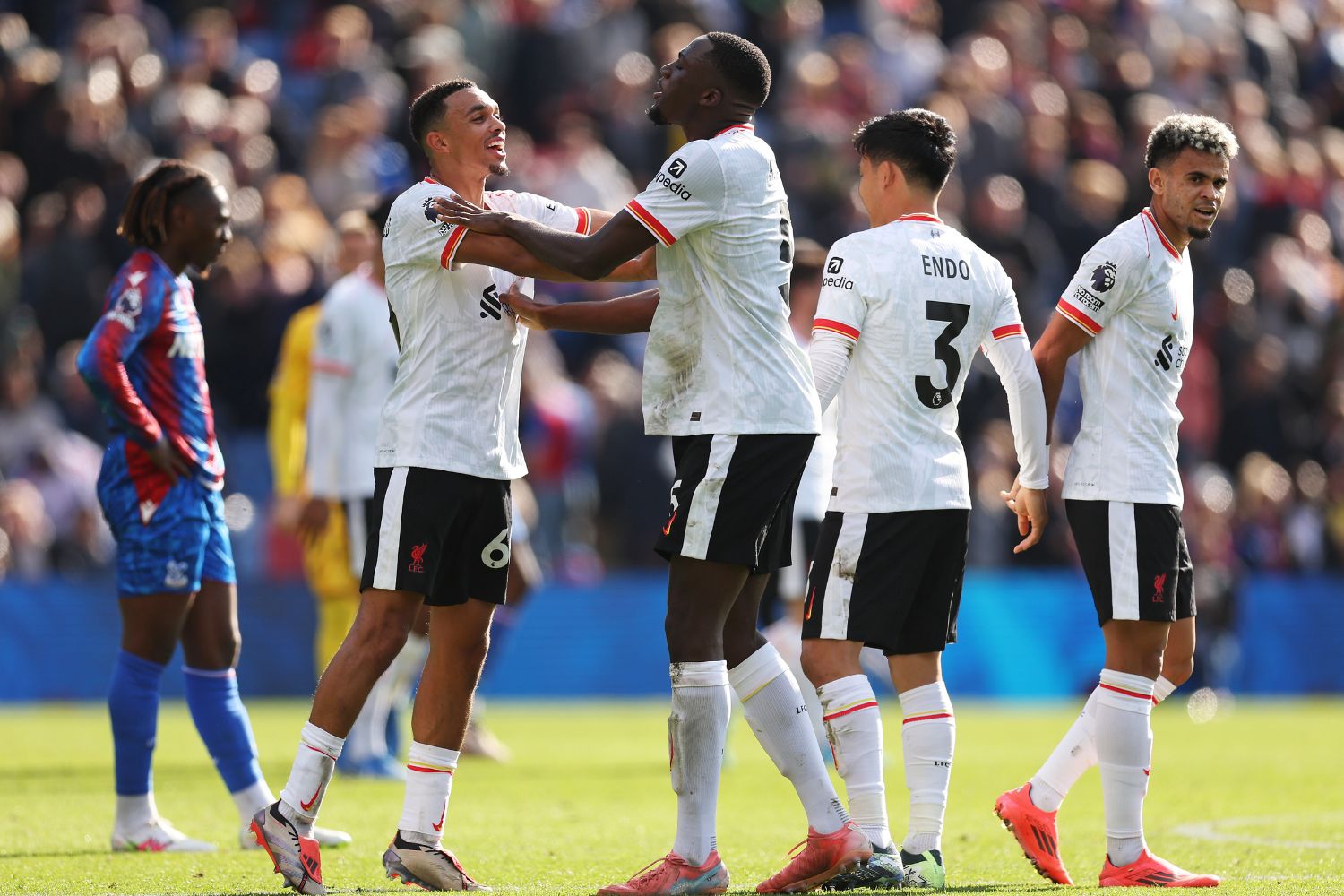 Trent Alexander-Arnold and Ibou Konate celebrate Liverpool's victory over Crystal Palace