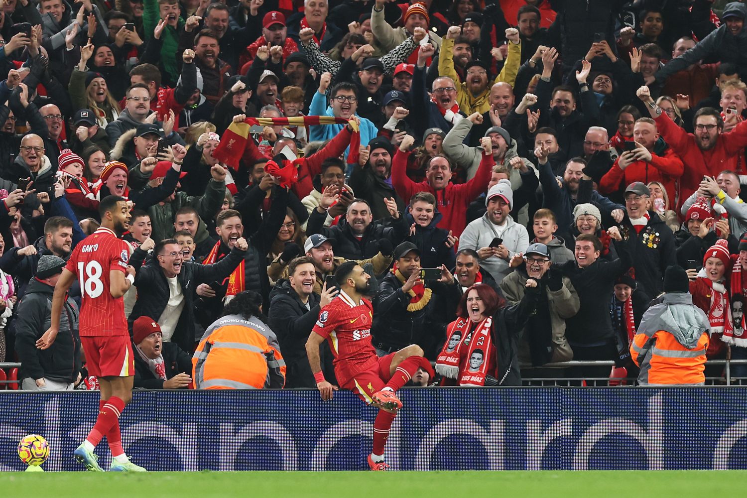 Mo Salah celebrates scoring against Aston Villa