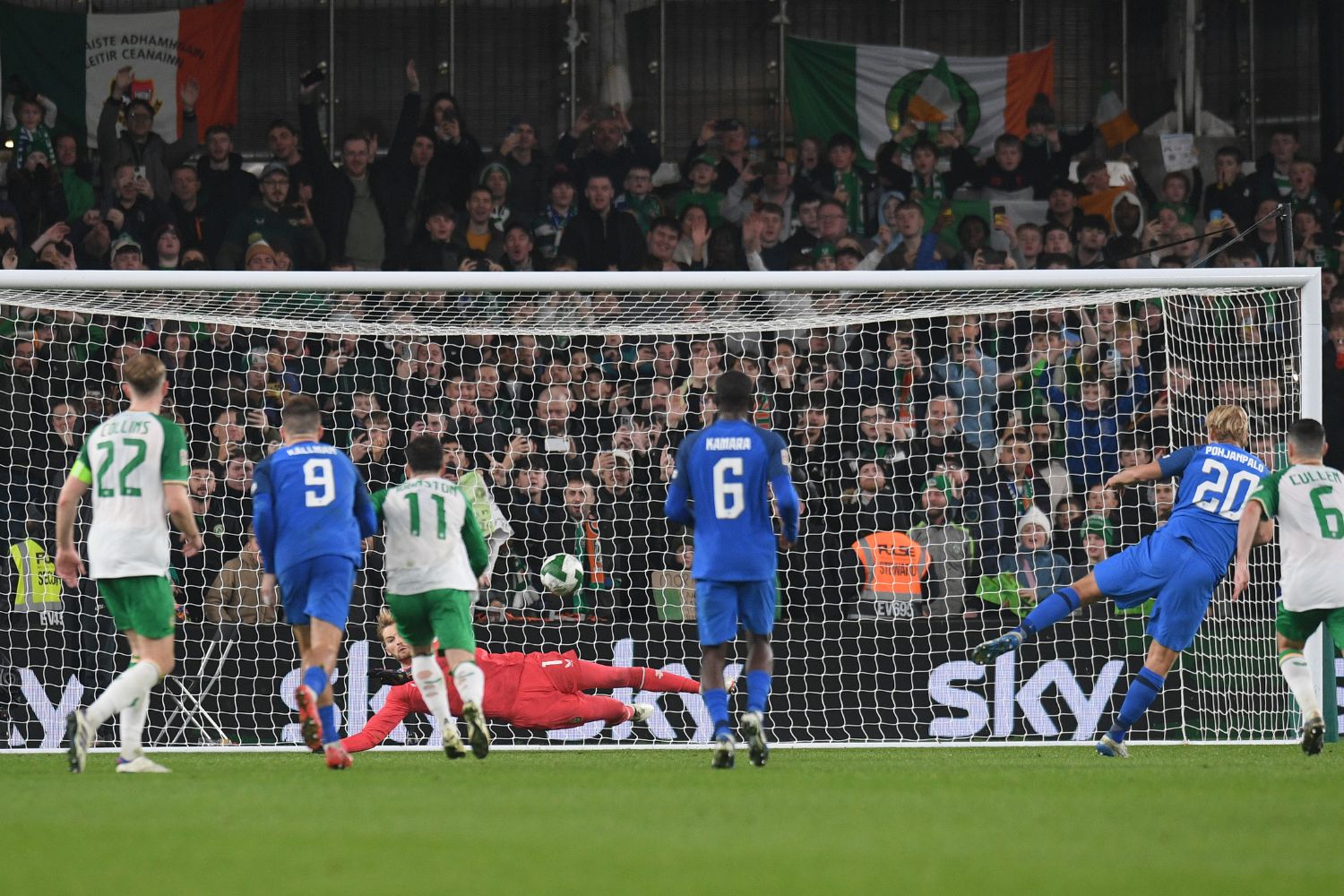 Caoimhin Kelleher saves a penalty for Ireland