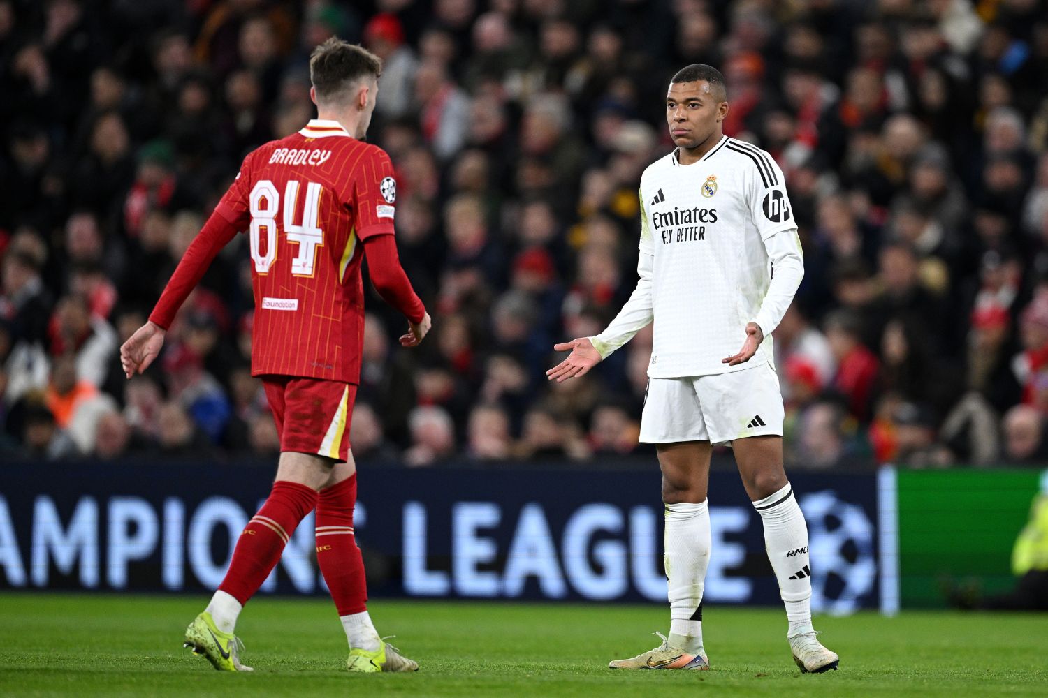 Conor Bradley faces up with Kylian Mbappe at Anfield