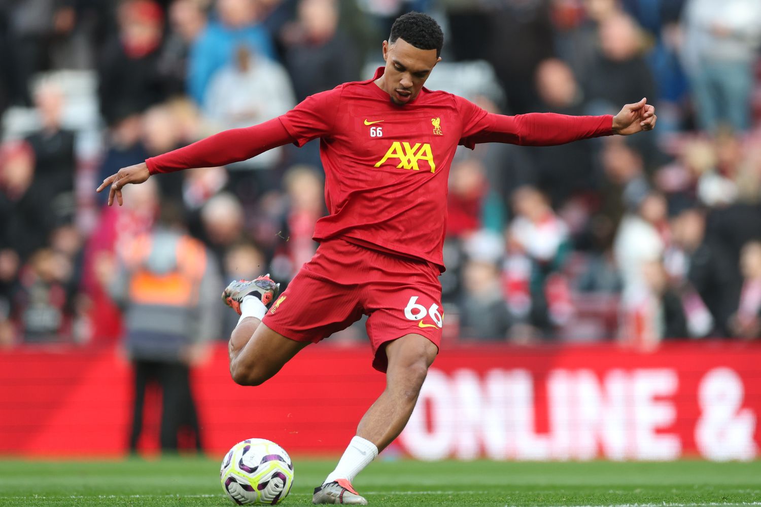 Trent Alexander-Arnold warms up for Liverpool