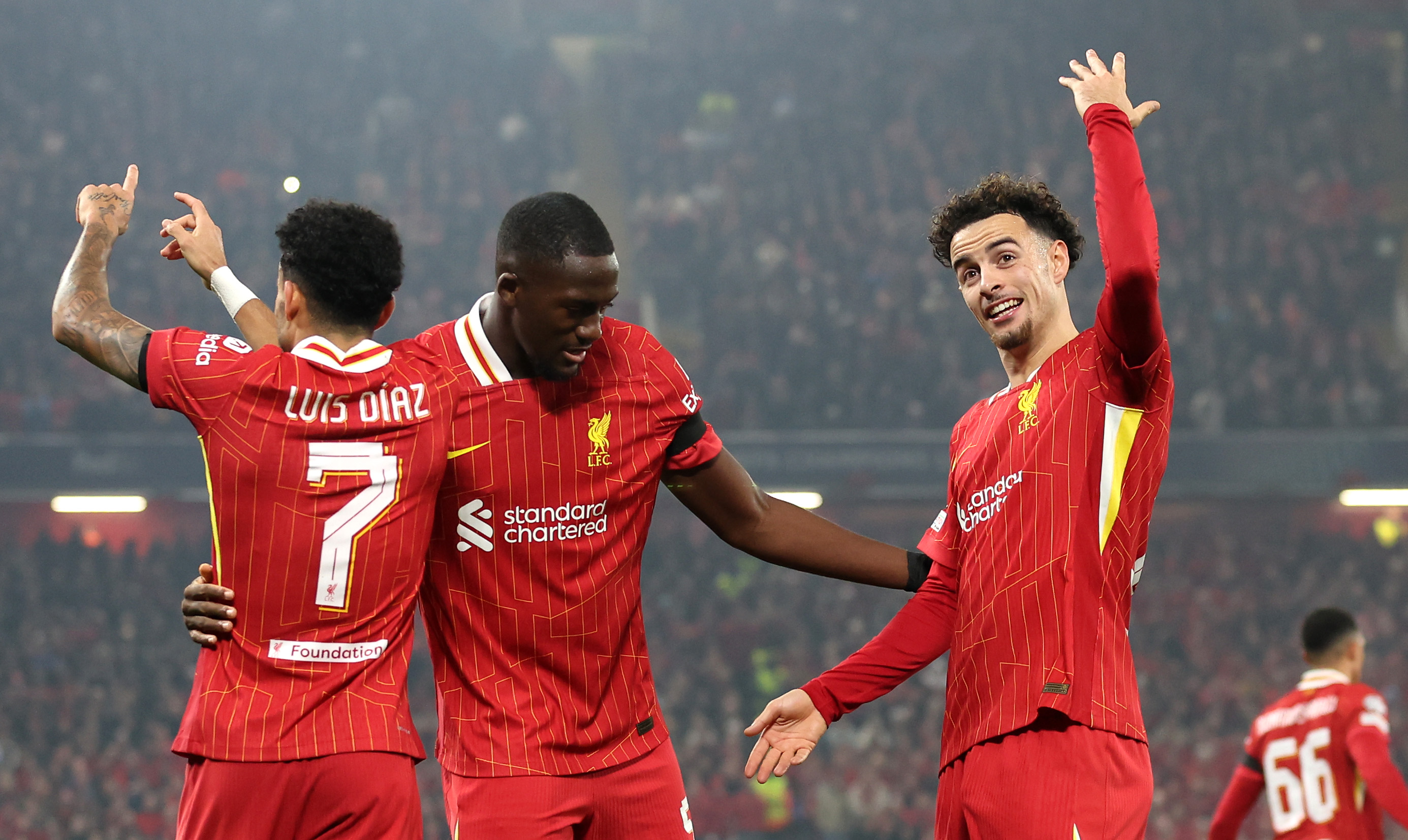 Luis Diaz, Ibrahima Konate and Curtis Jones celebrate the Colombian's first goal against Leverkusen