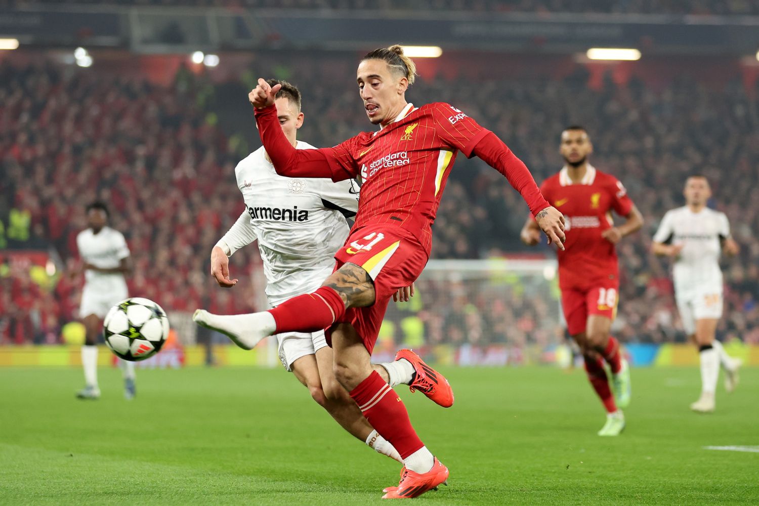 Kostas Tsimikas plays against Bayer Leverkusen.