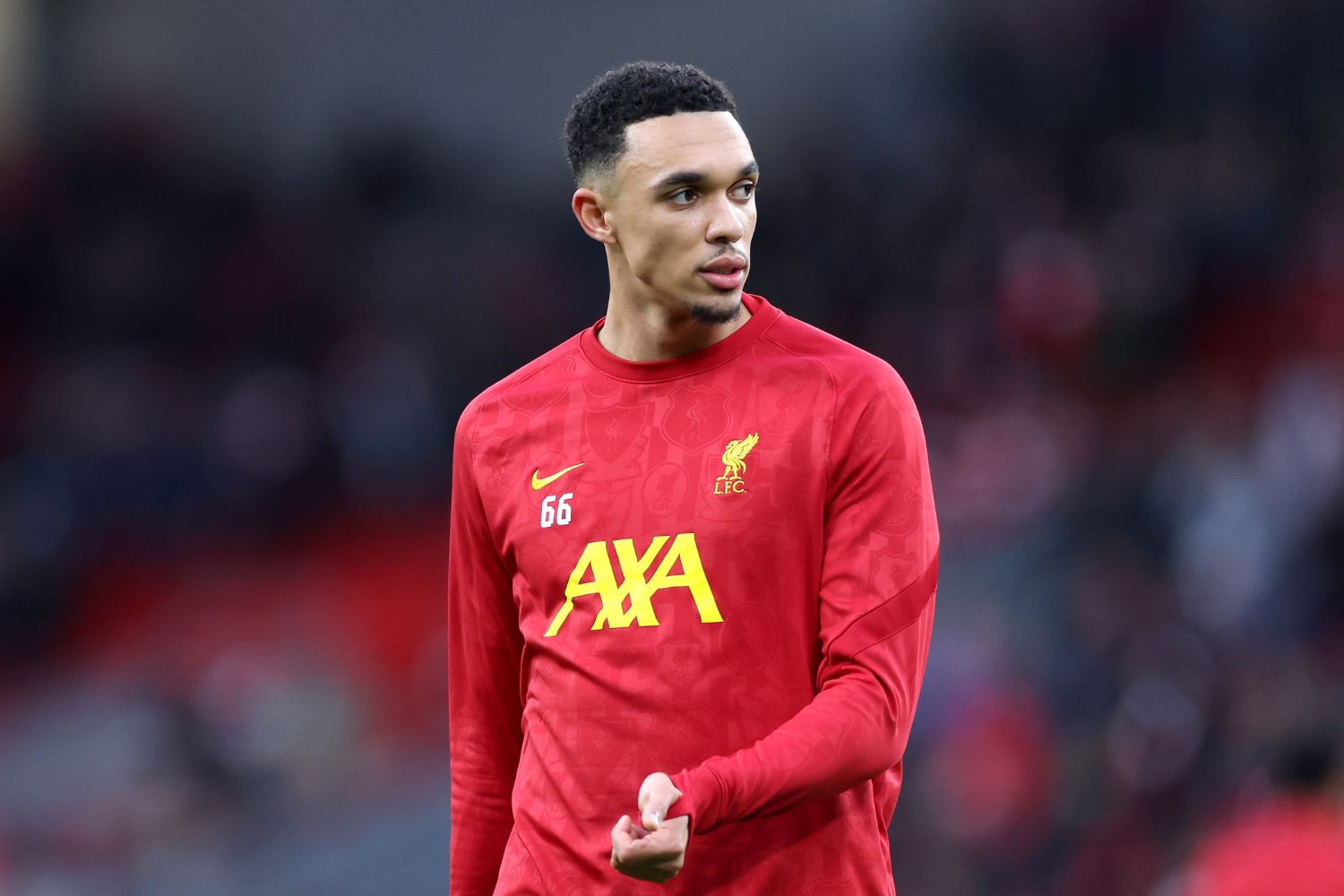 Trent Alexander-Arnold warms up for Liverpool