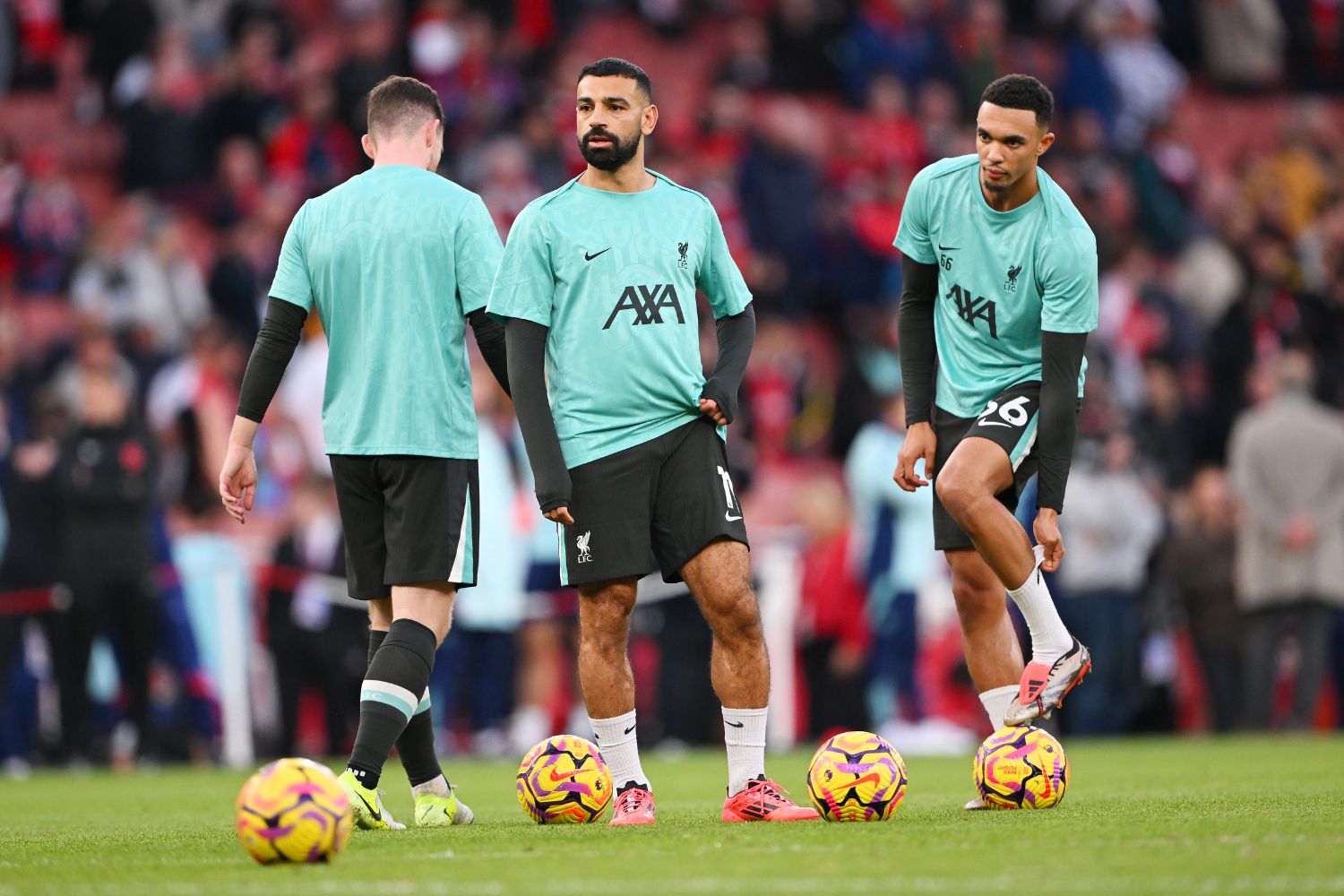 Alexander-Arnold and Salah warm up for Liverpool