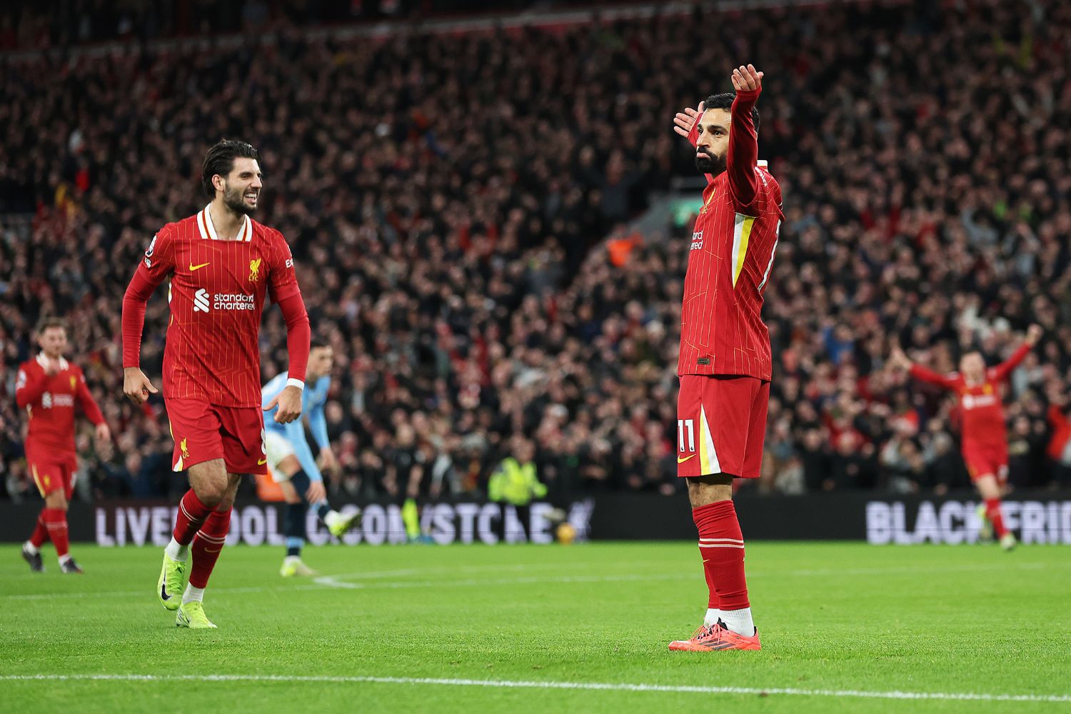 Mo Salah celebrates after Liverpool's Man City opener