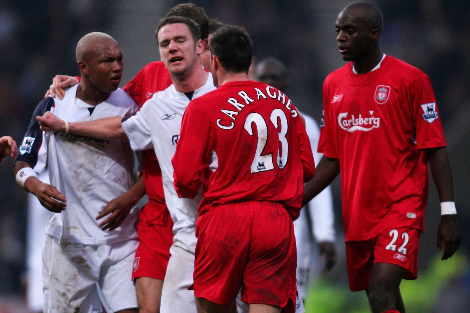 El Hadji Diouf clashes with Liverpool players