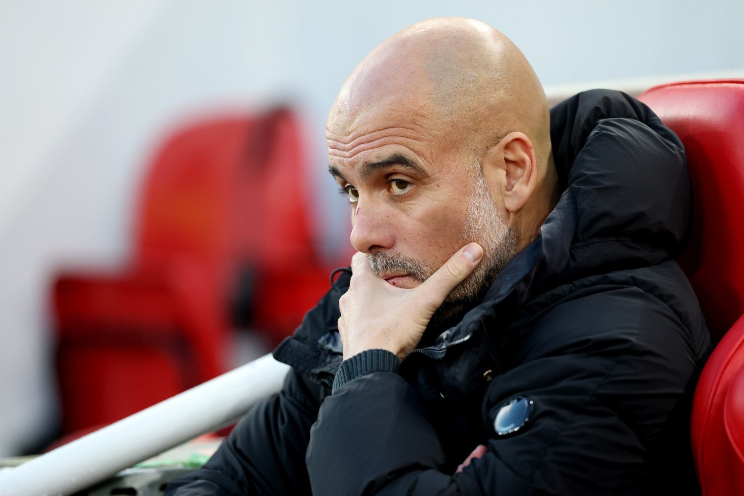 Pep Guardiola struggles at Anfield