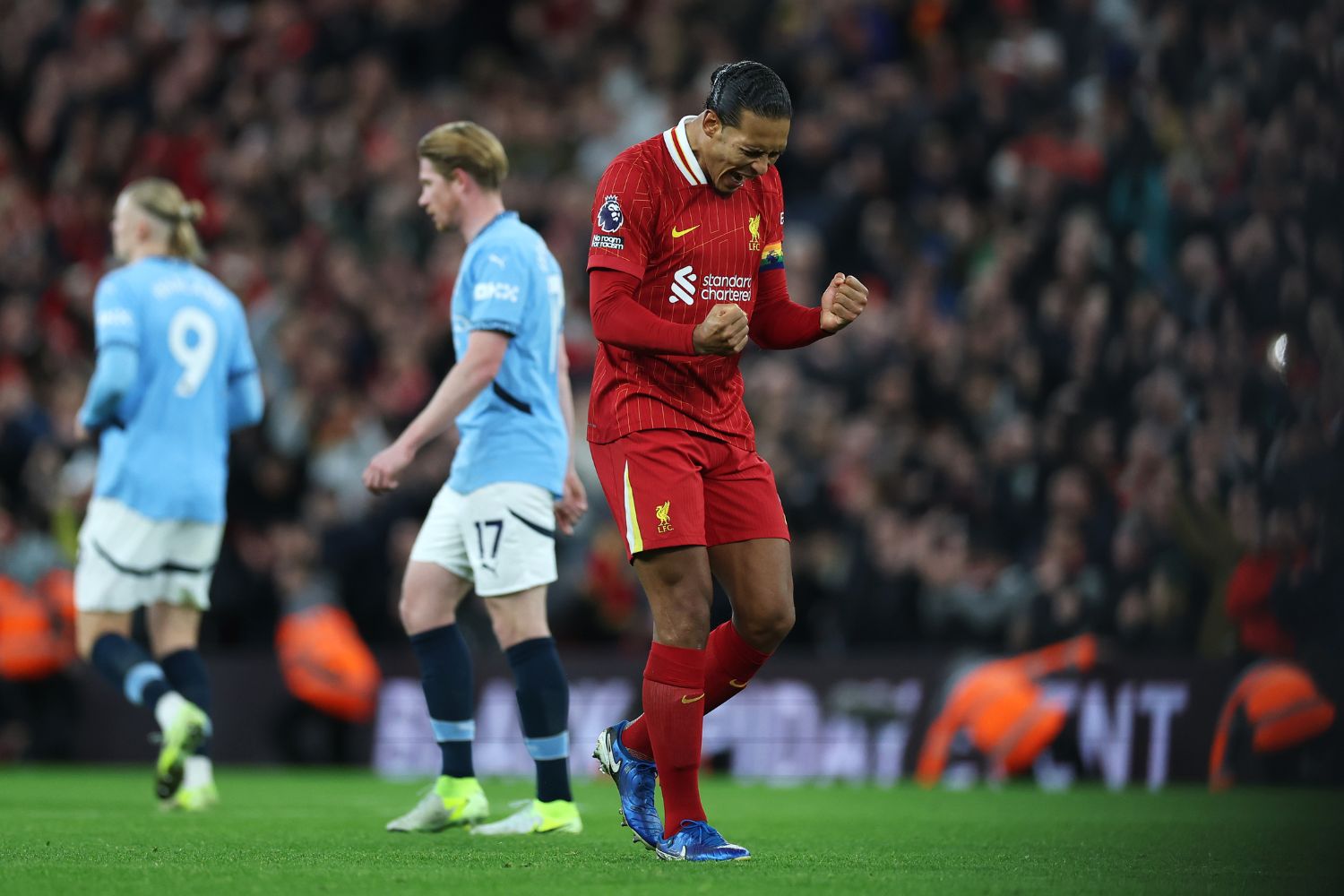 Virgil van Dijk celebrates defeating Manchester City at Anfield