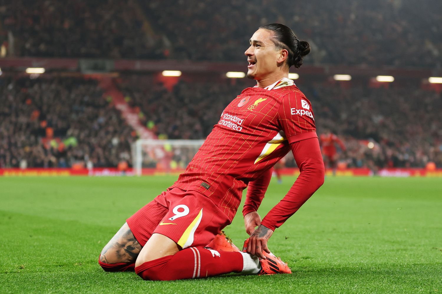 Darwin Nunez celebrates with Liverpool fans after scoring