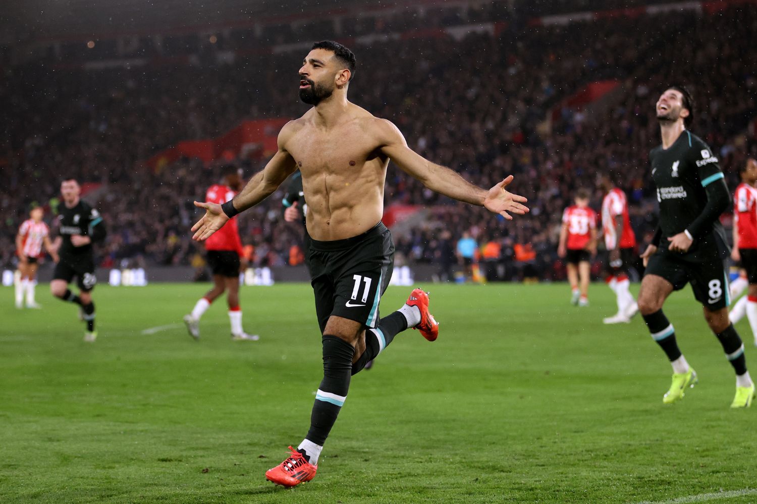 Mo Salah celebrates scoring against Southampton