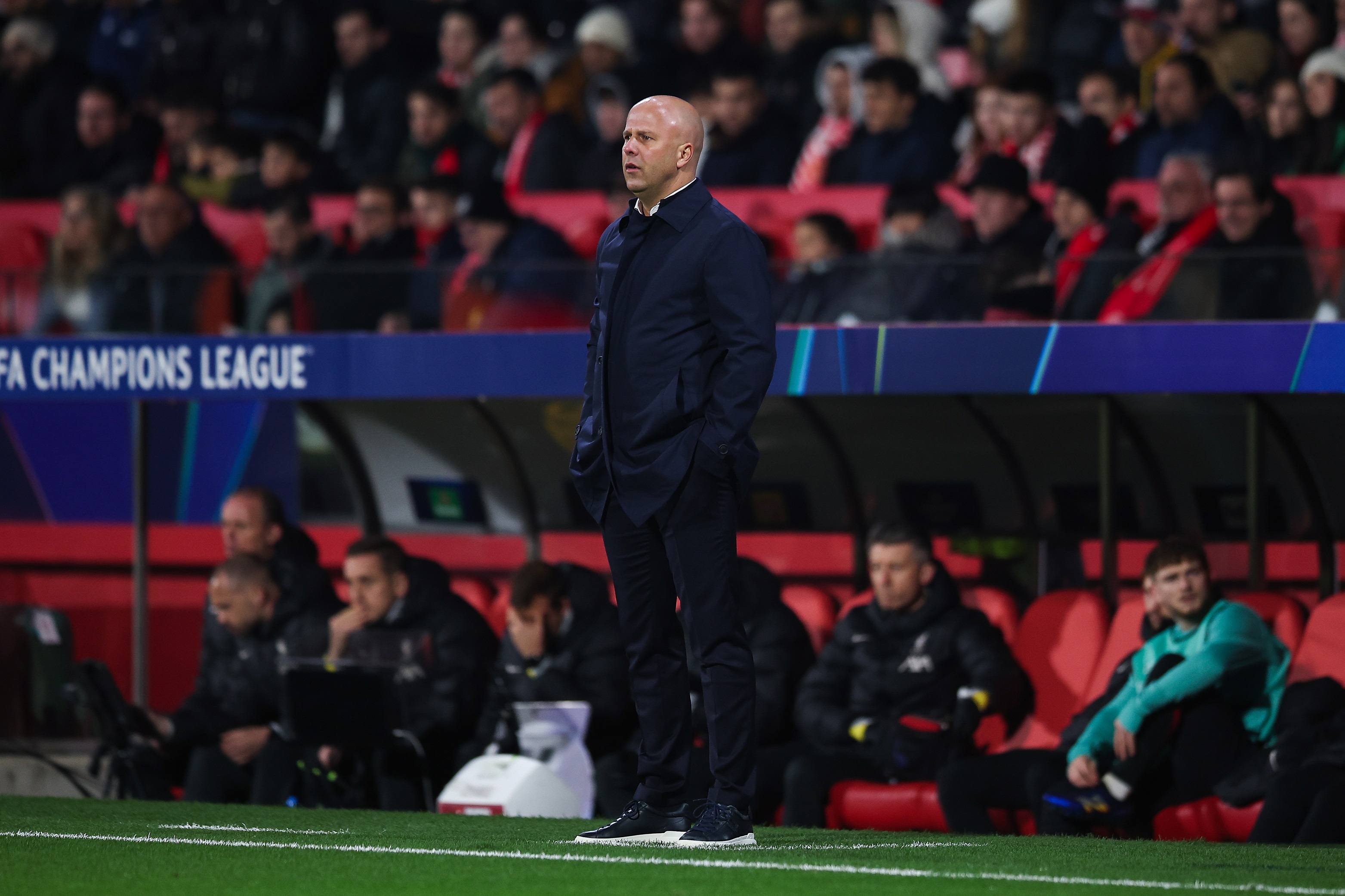 Arne Slot watches his Liverpool side play against Girona.