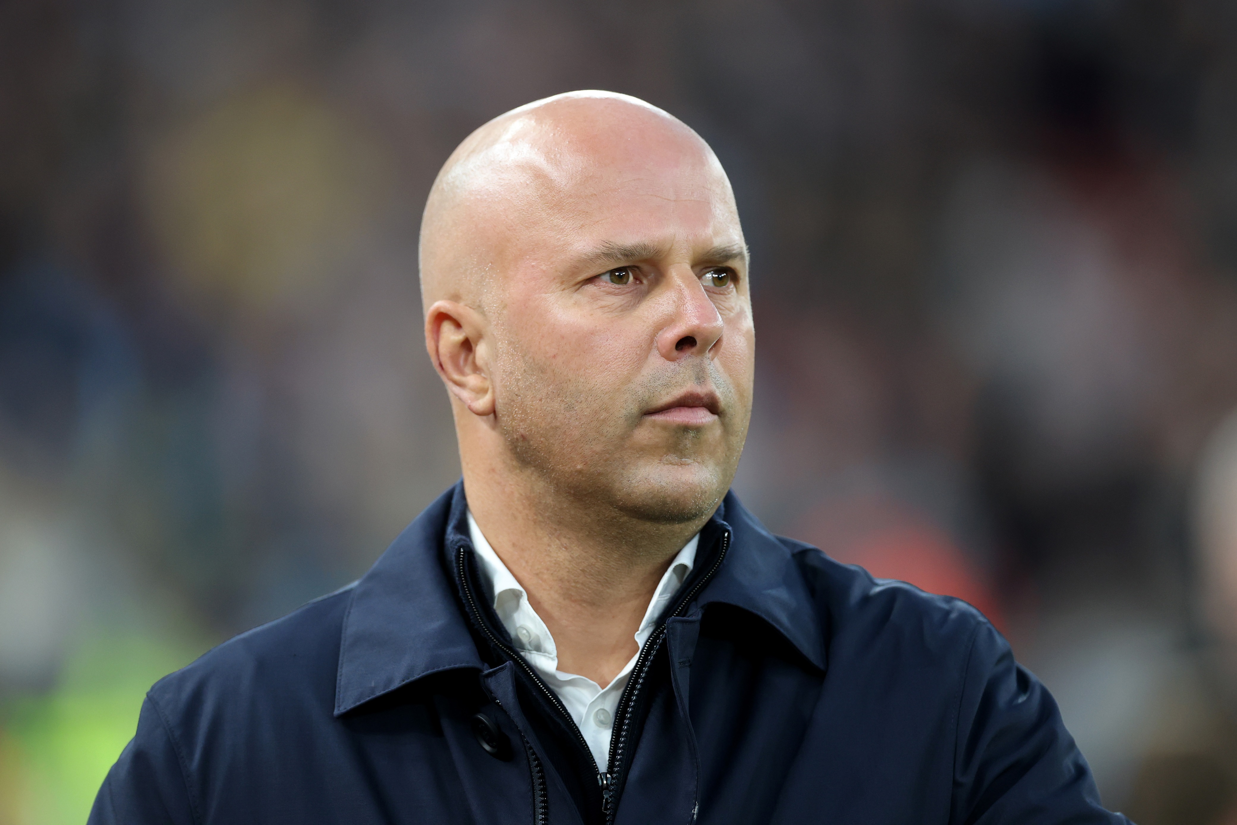 Liverpool head coach Arne Slot observes his side during Manchester City's visit.