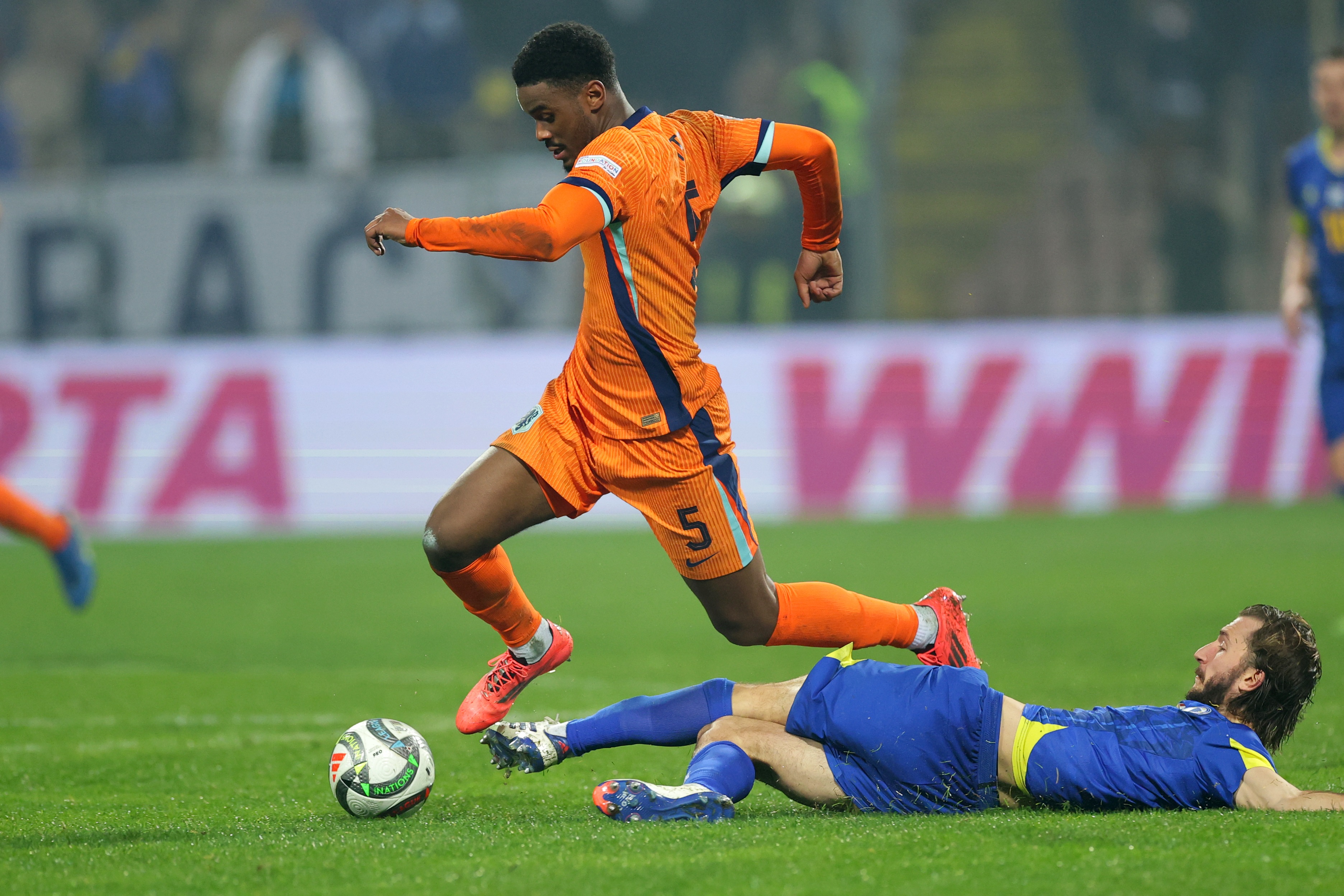 Jorrel Hato evades a challenge during Holland v Bosnia and Herzegovina.
