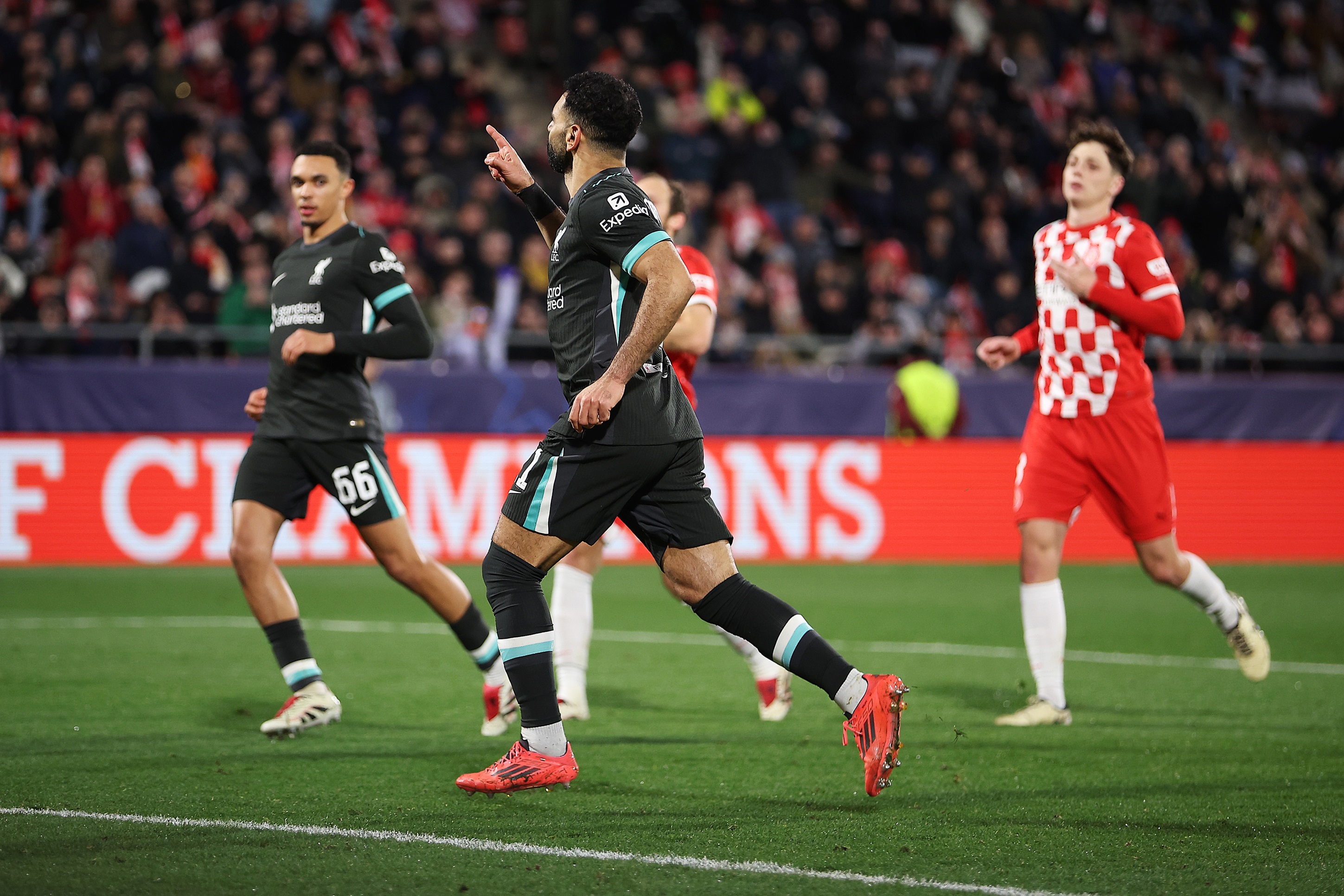 Mo Salah celebrates scoring his penalty against Girona in the Champions League.