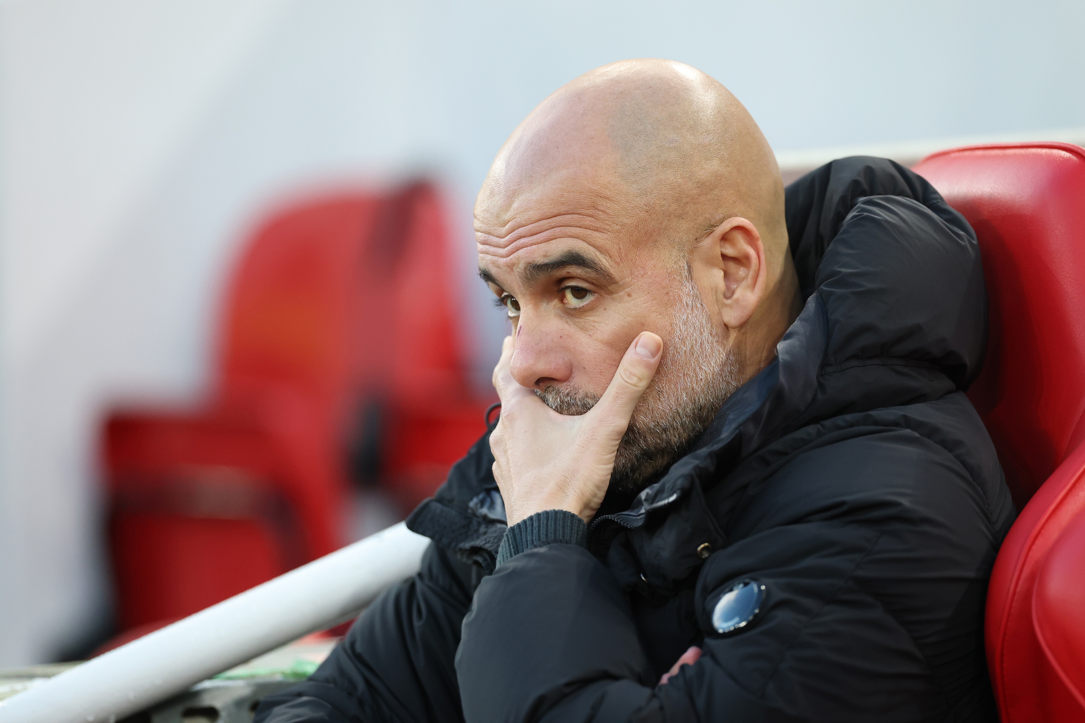 Pep Guardiola looks despondent during Liverpool v Man City.