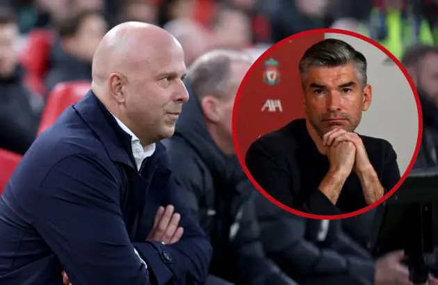 Arne Slot looks on from the Liverpool bench at sporting director Richard Hughes.