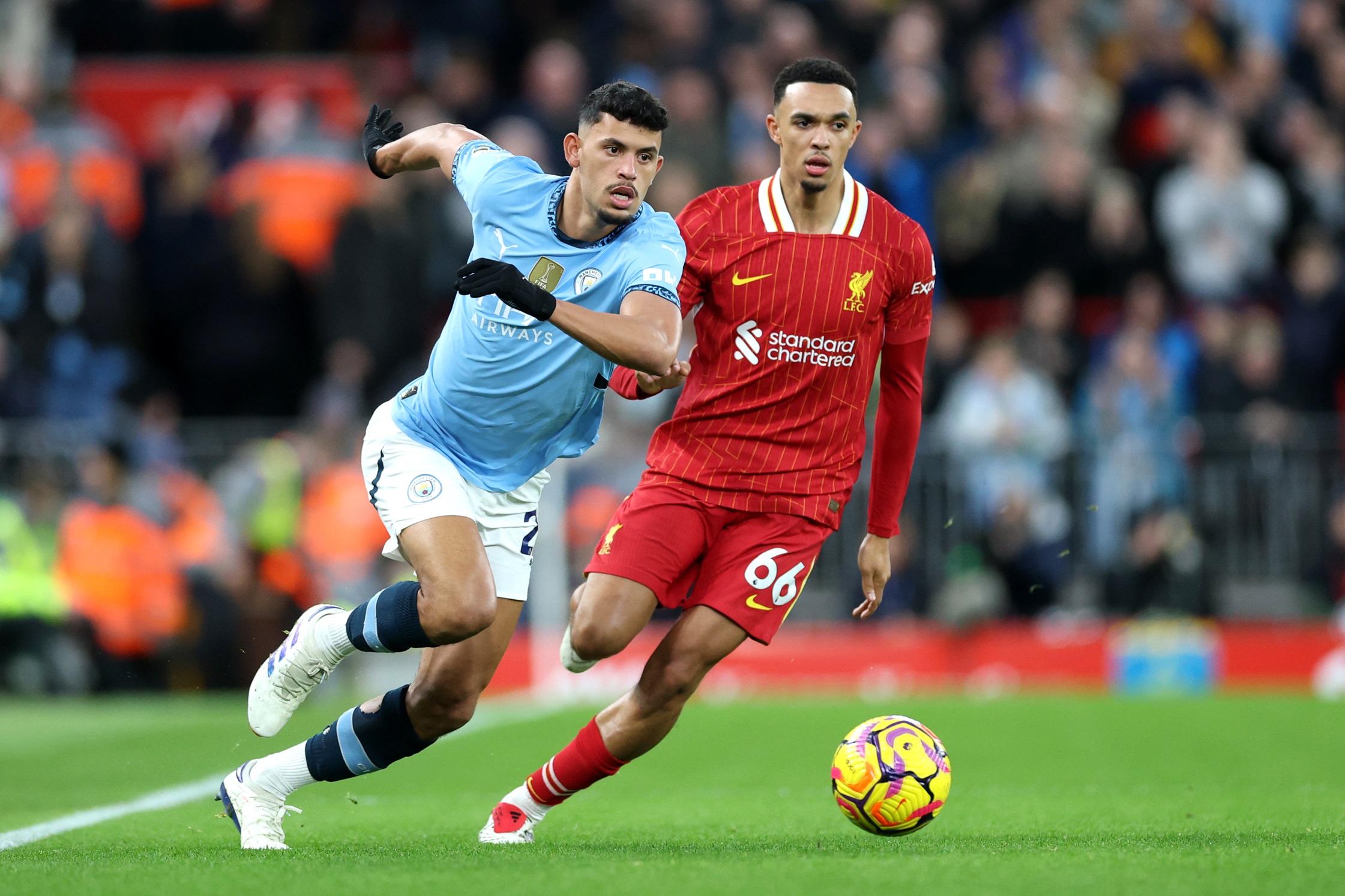 Trent Alexander-Arnold and Matheus Nunes in action.