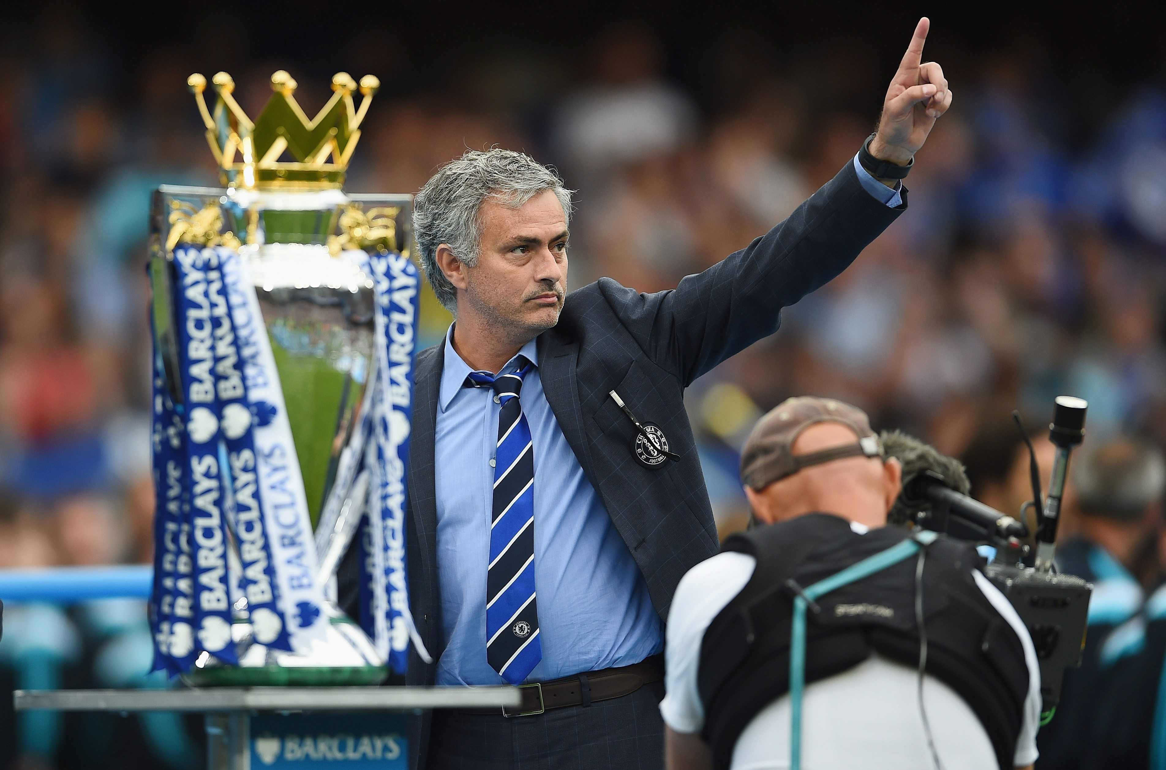 Jose Mourinho celebrates with the Premier League trophy in 2015.