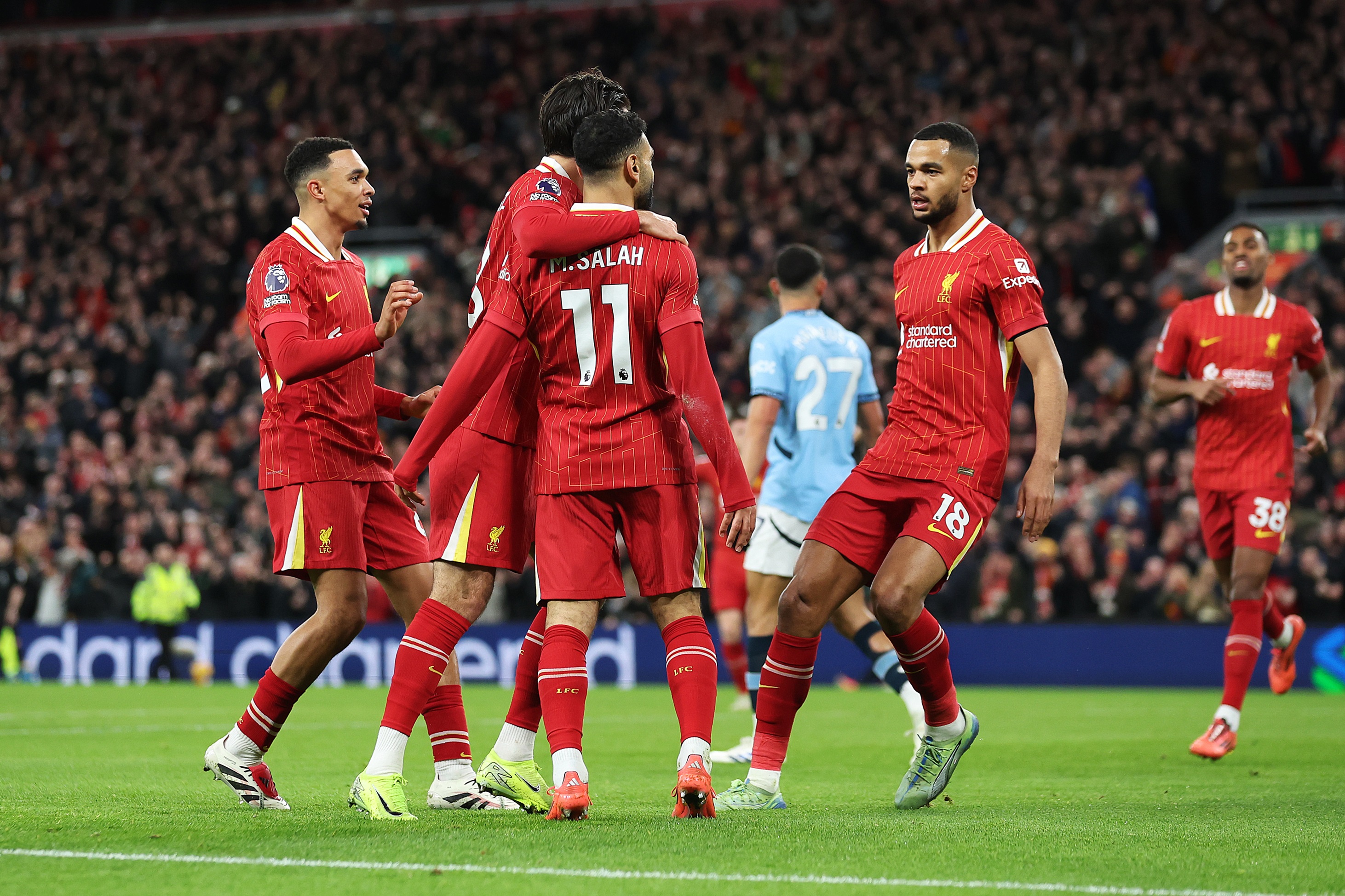Liverpool's Mo Salah celebrates with his teammates.