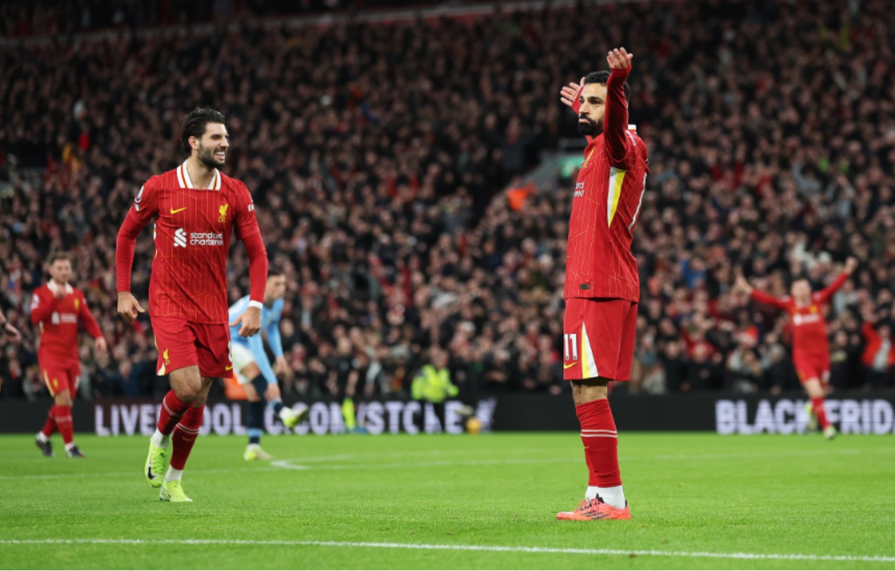 Mo Salah celebrates Cody Gakpo's goal against Manchester City