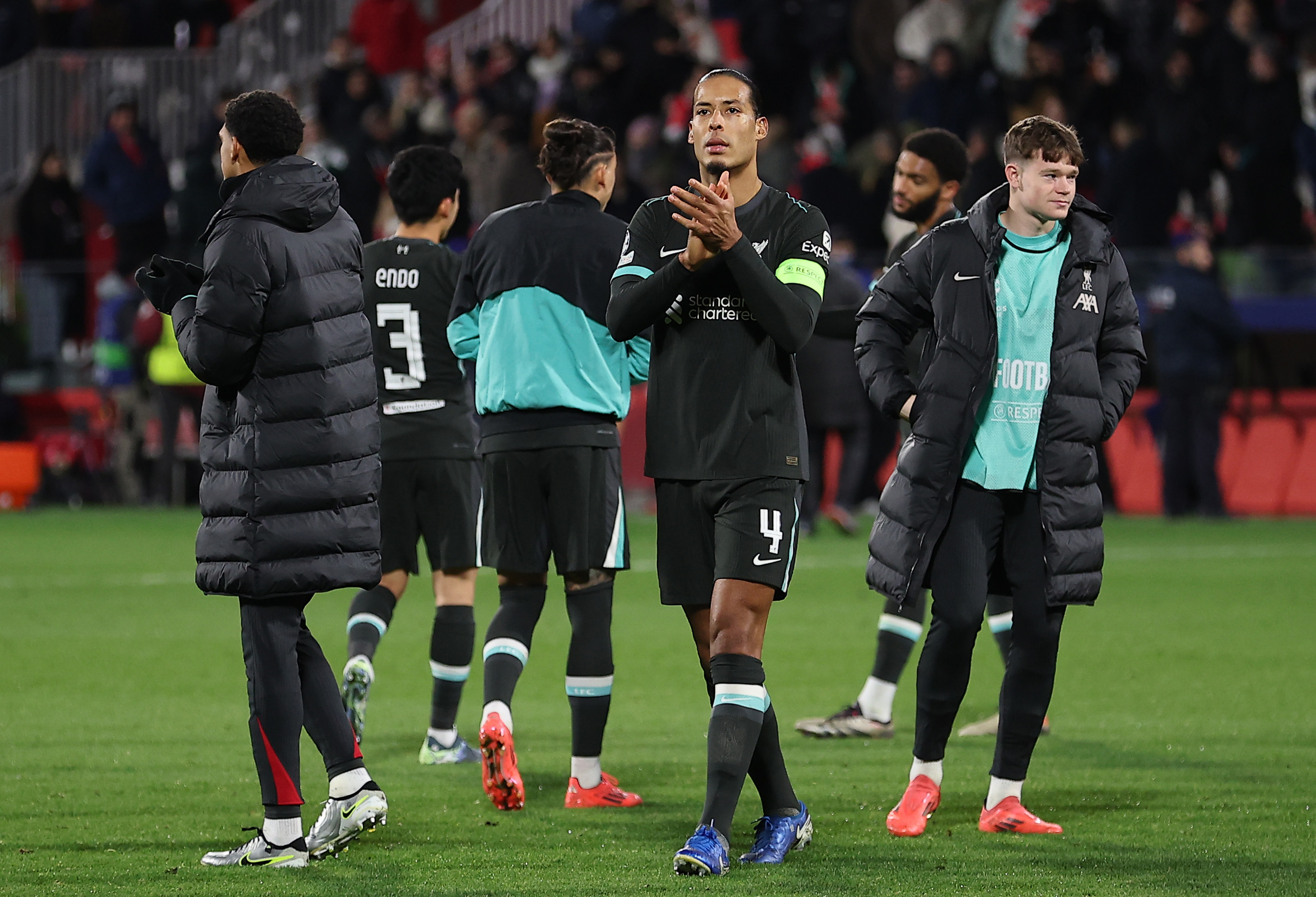 Virgil van Dijk applauds the Liverpool fans after the Reds' victory in Girona