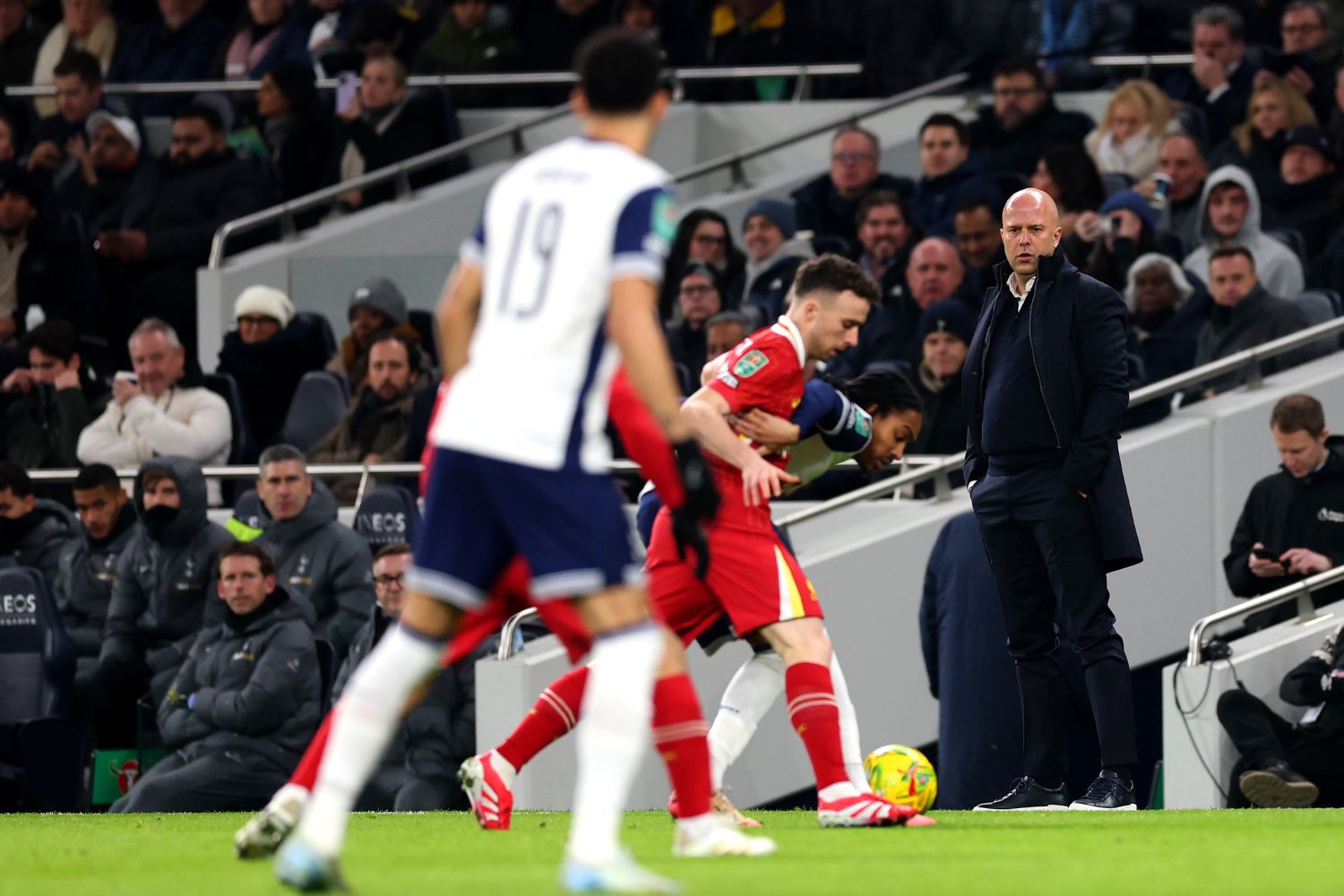 Arne Slot watches on as Liverpool play against Tottenham