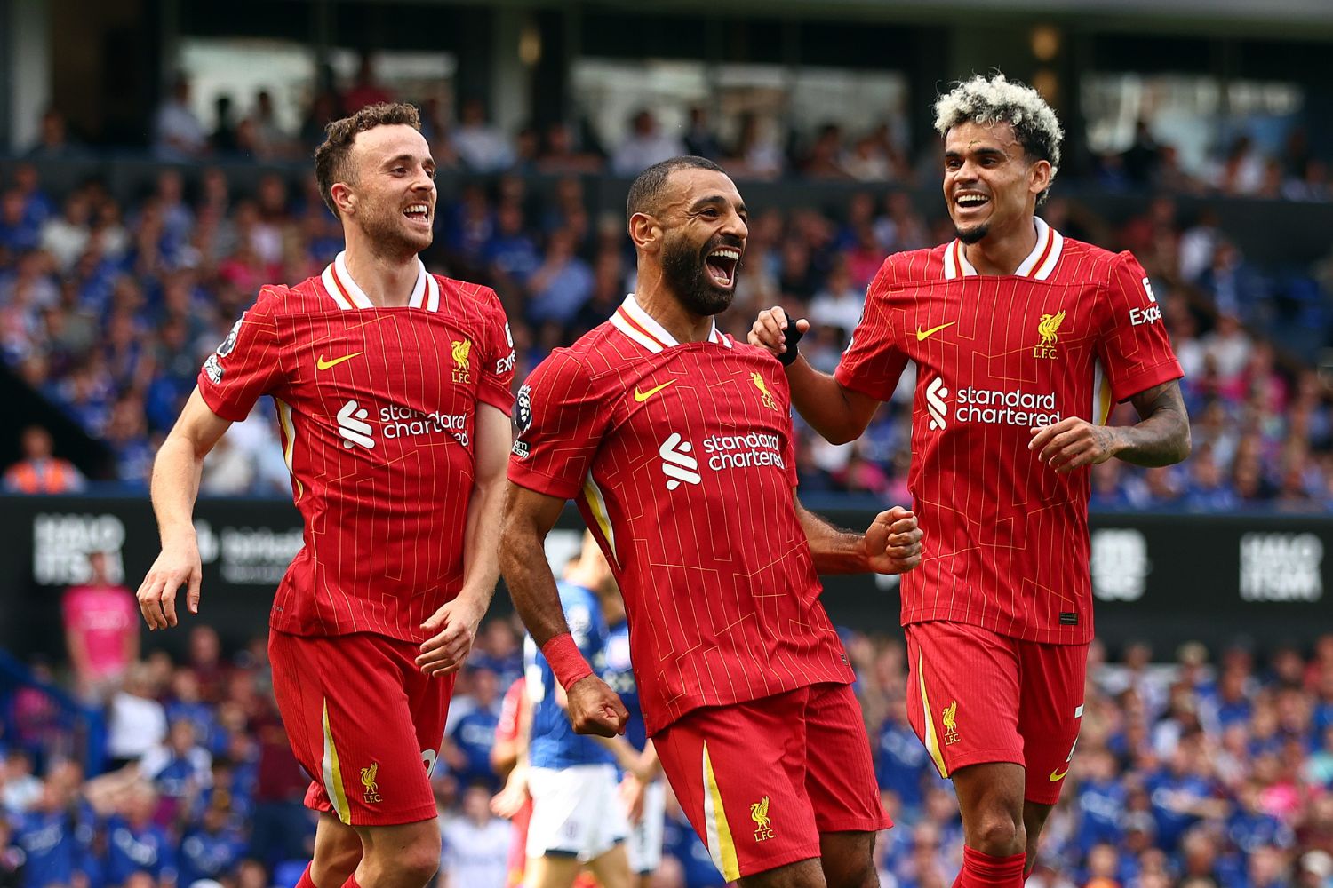 Luis Diaz, Diogo Jota and Mo Salah celebrate against Ipswich