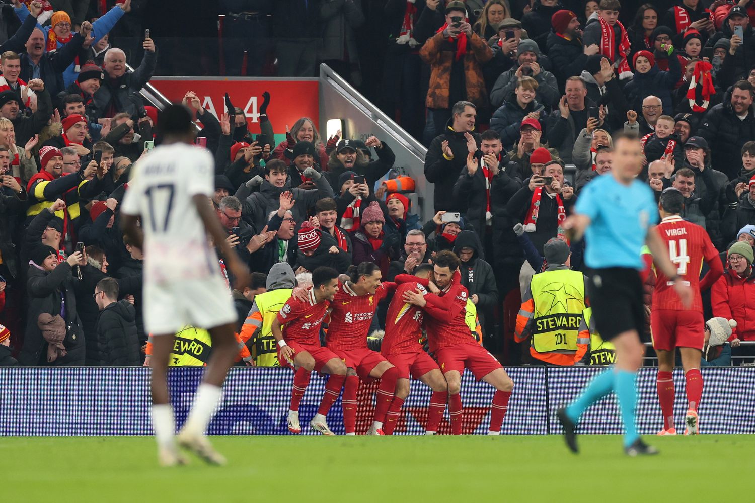 Mo Salah celebrates scoring against Lille