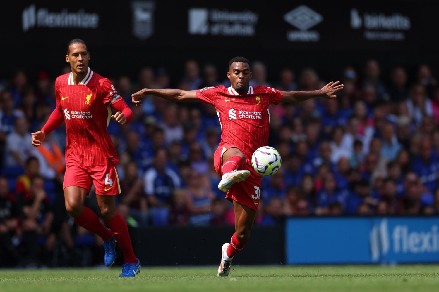 Ryan Gravenberch and Virgil van Dijk in action against Ipswich