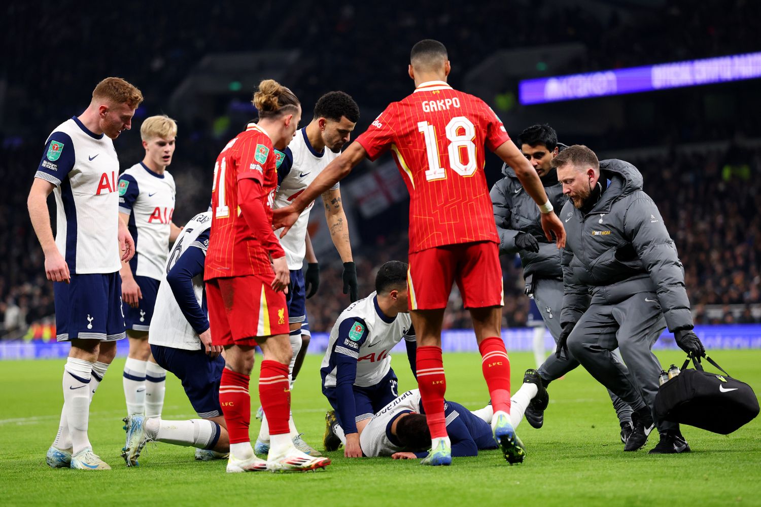 Rodrigo Bentancur lays on the floor against Liverpool