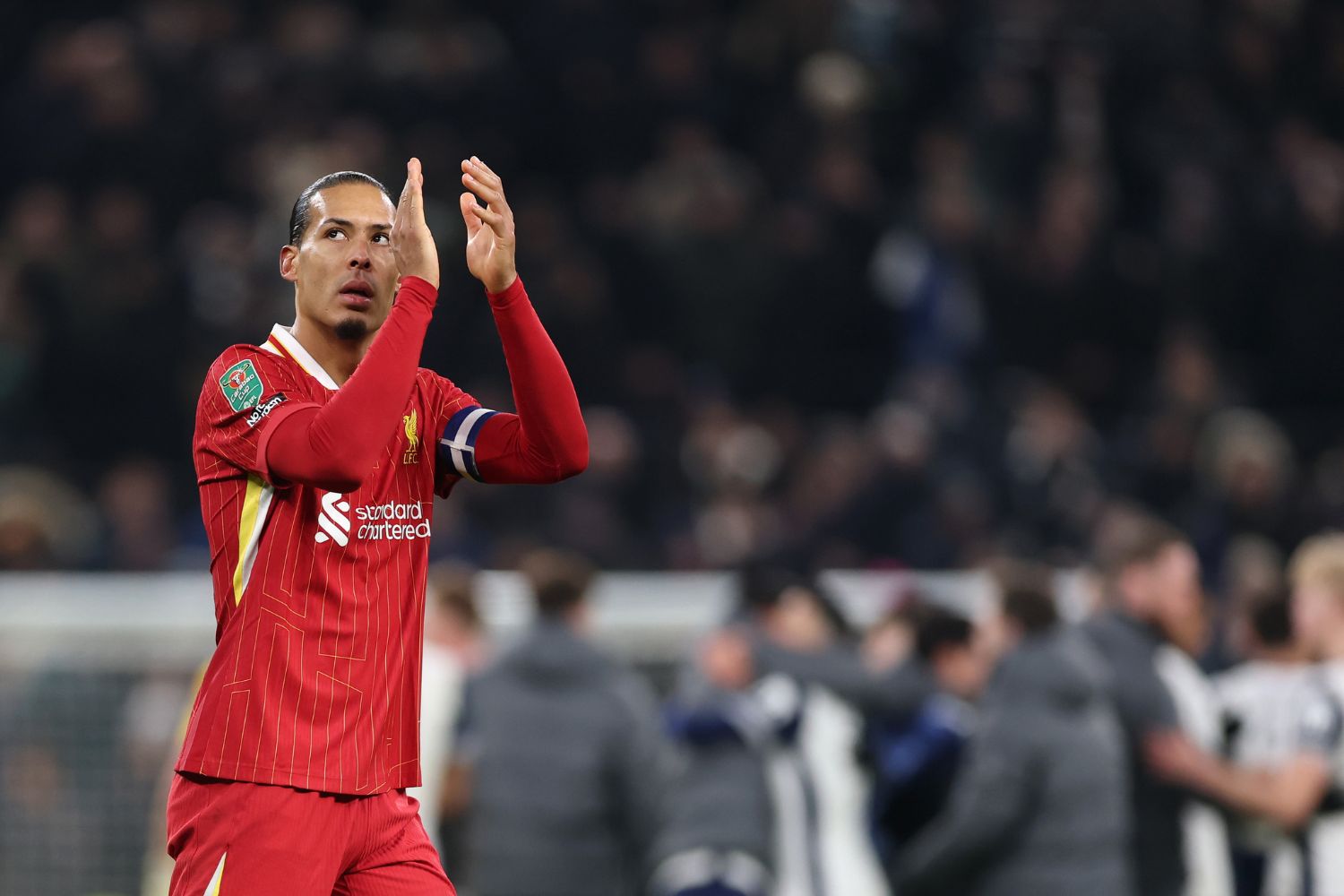 Virgil van Dijk applauds Liverpool fans at Tottenham