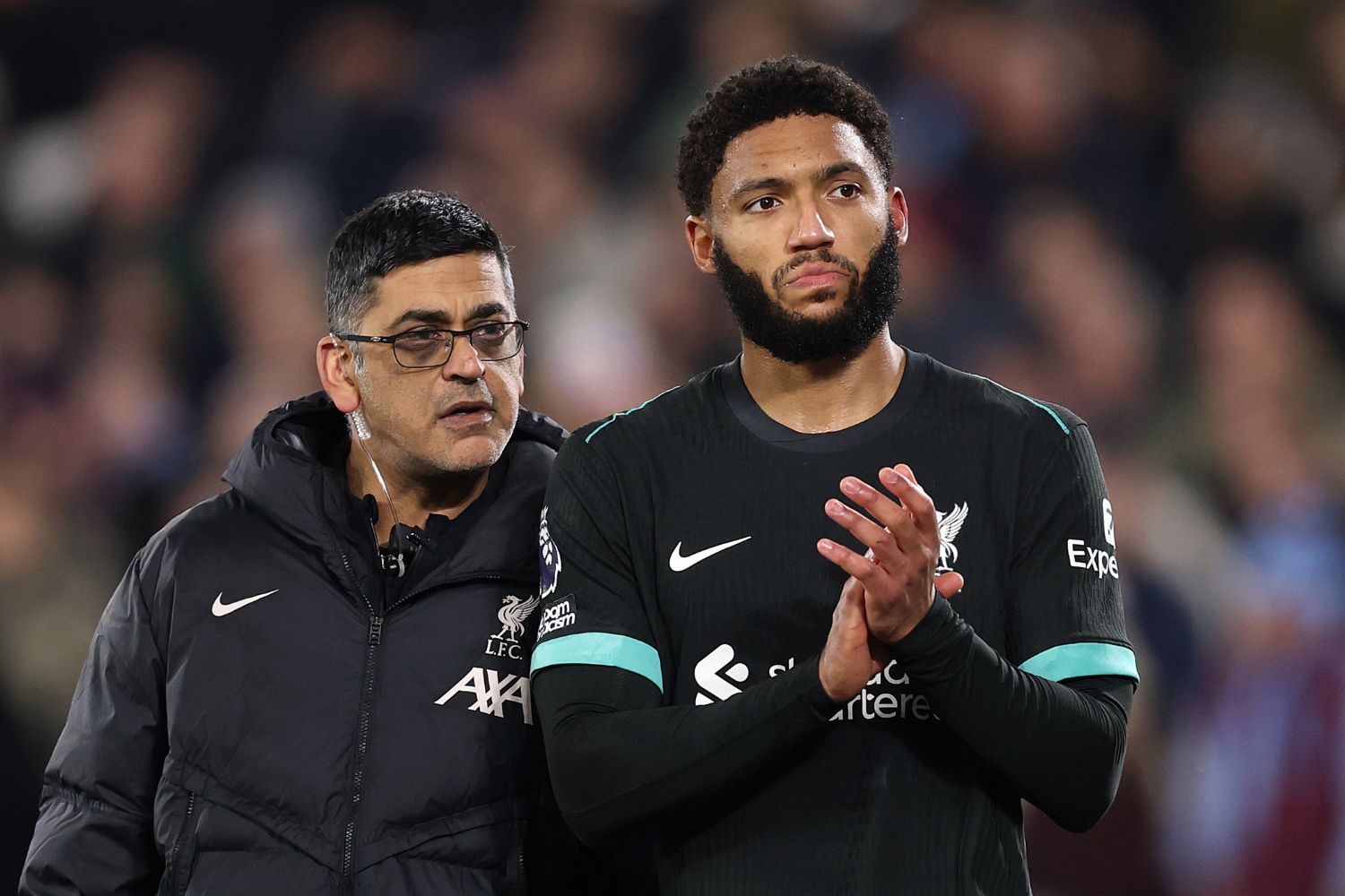 Joe Gomez limps off injured for Liverpool